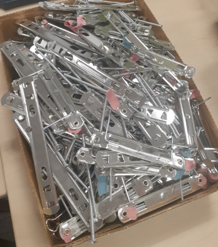 Image of box of metal parts from spring files for recycling